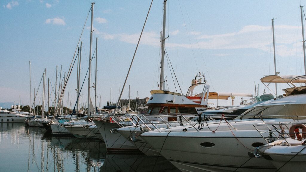 Boats docked at a marina for a guide to estimating boat loan payments by credit score